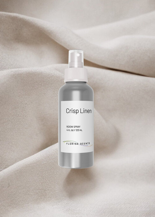 Crisp Linen Room Spray by Florida Scents Essentials in a sleek silver bottle, ideal for refreshing home fabrics with a clean, powdery scent.
