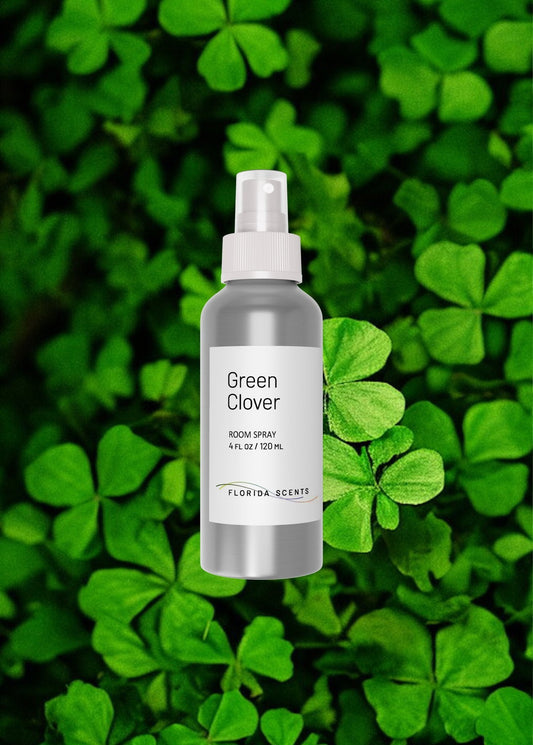Green Clover Room Spray by Florida Scents Essentials with 4 fl oz bottle, set against fresh clover leaves. Ideal for home fragrance lovers.
