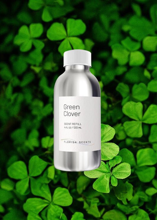 Green Clover Scent Refill by Florida Scents Essentials placed over fresh clover leaves, ideal for home fragrance with citrus, jasmine, and musk notes.