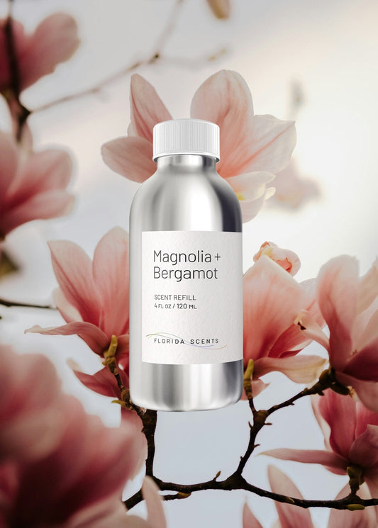 Magnolia & Bergamot Scent Refill by Florida Scents Essentials with blooming magnolia flowers, ideal for home fragrance and calming decor.